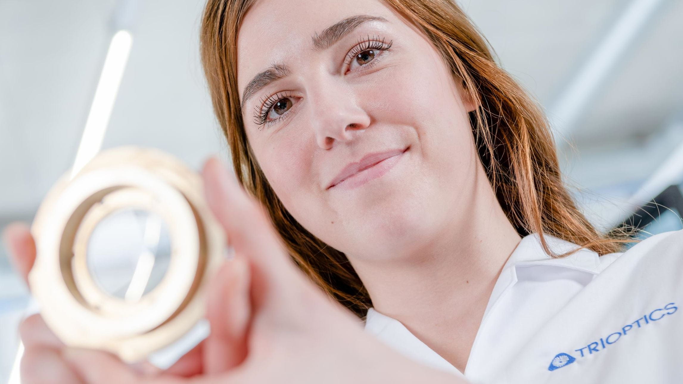 Woman with lens